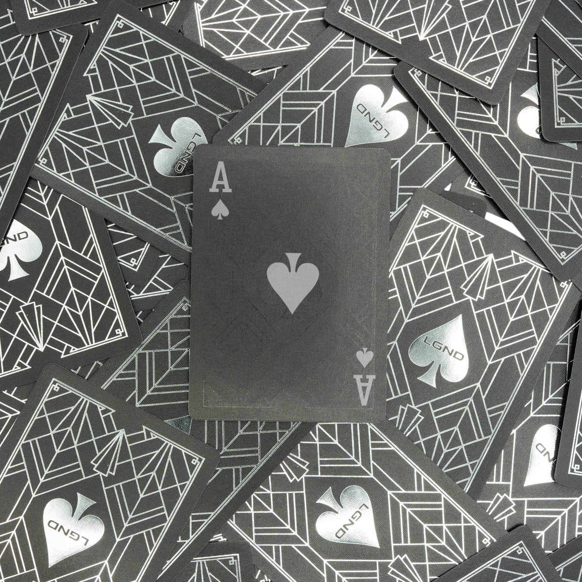 Ace of spades on a pile of LGND Playing Cards